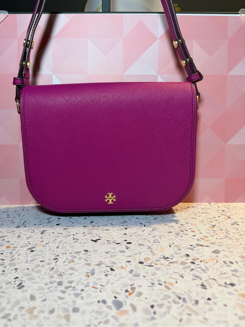 Tory Burch fuchsia Saffiano leather crossbody saddle bag with gold logo